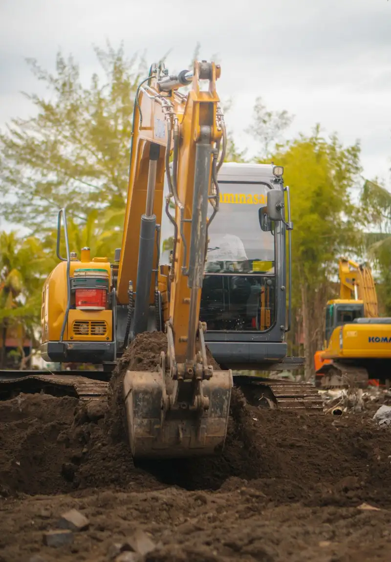 Excavator digging a house foundation